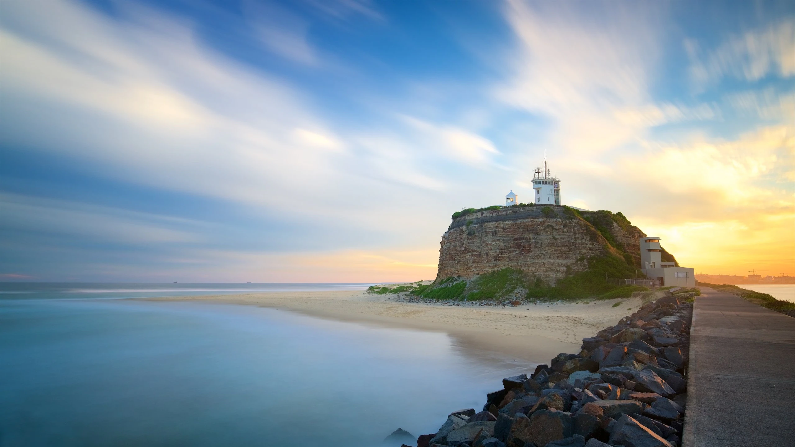 Walking along Newcastle beach